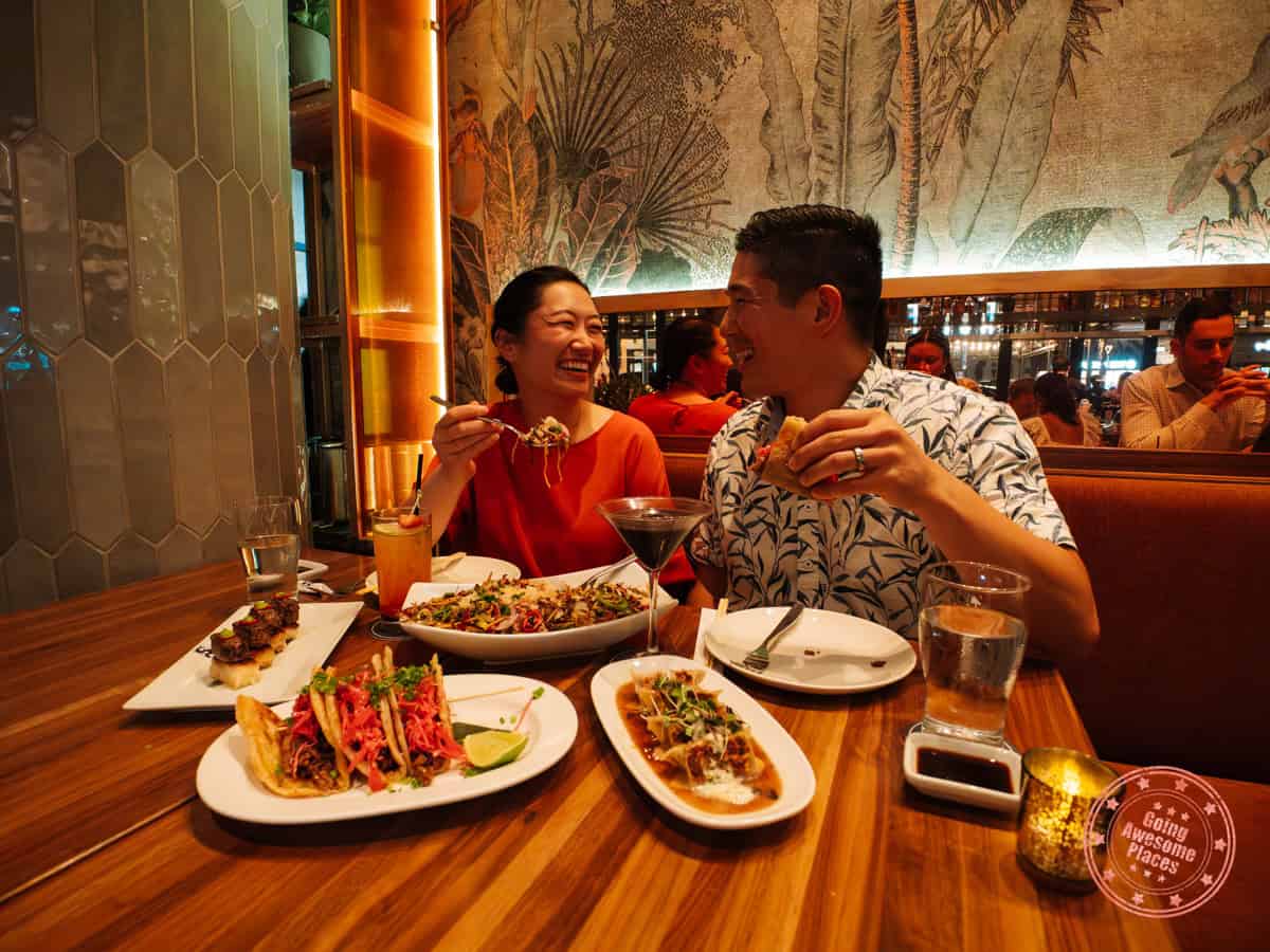 asian couple eating dinner at sunda new asian restaurant in midtown tampa