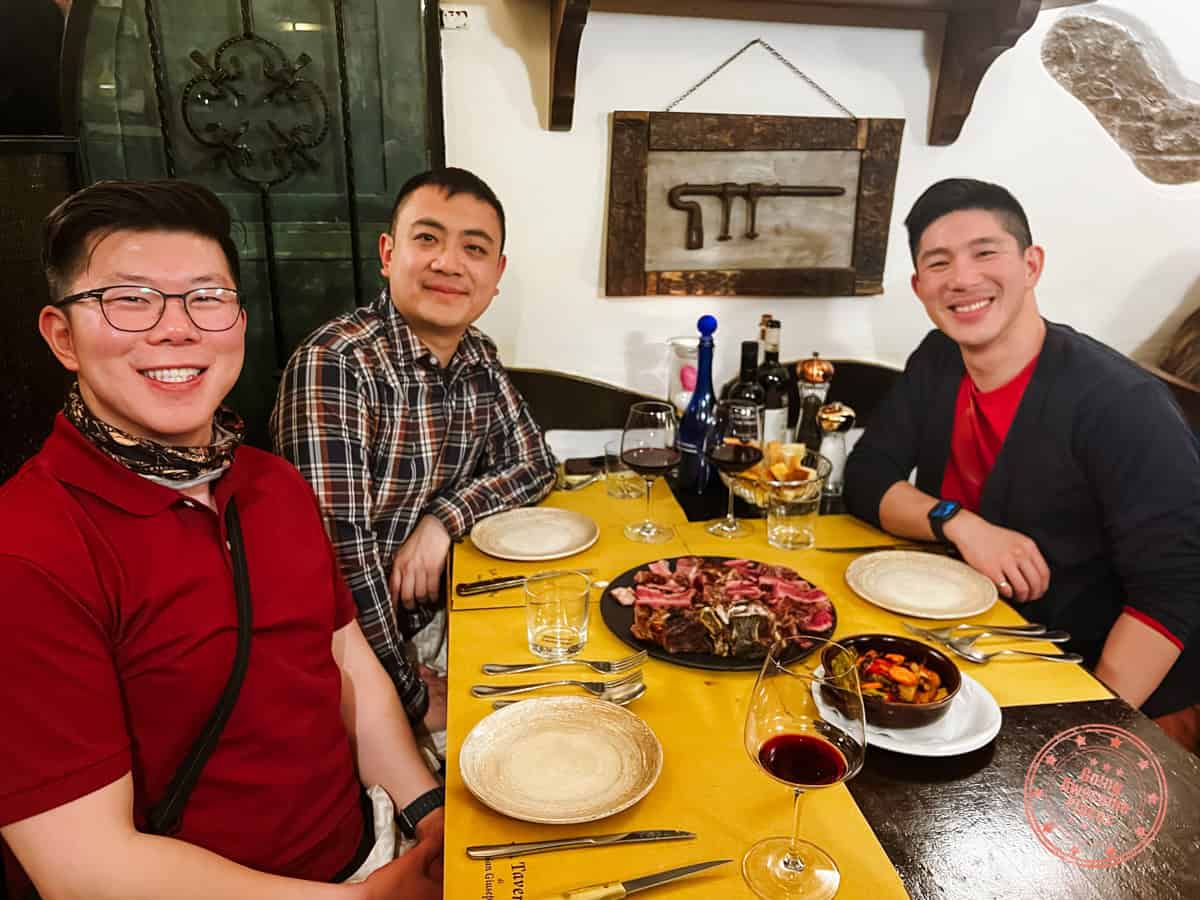 3 asian eating at taverna di san giuseppe