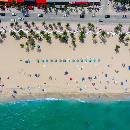 aerial view of beach goers at a beach in fort lauderdale