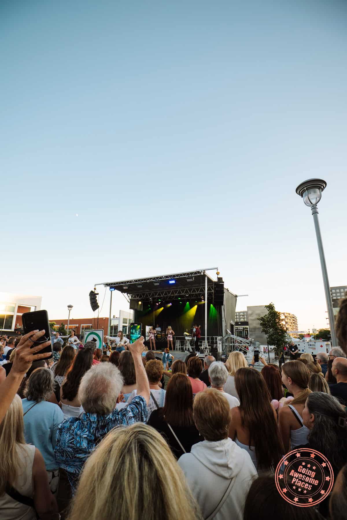 watching the abba tribute concert at centropolis in laval in the summer