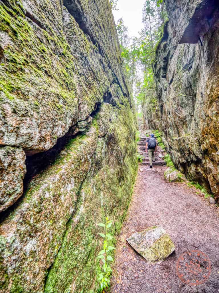 trail up a rocky chasm in agawa rock pictographs hike