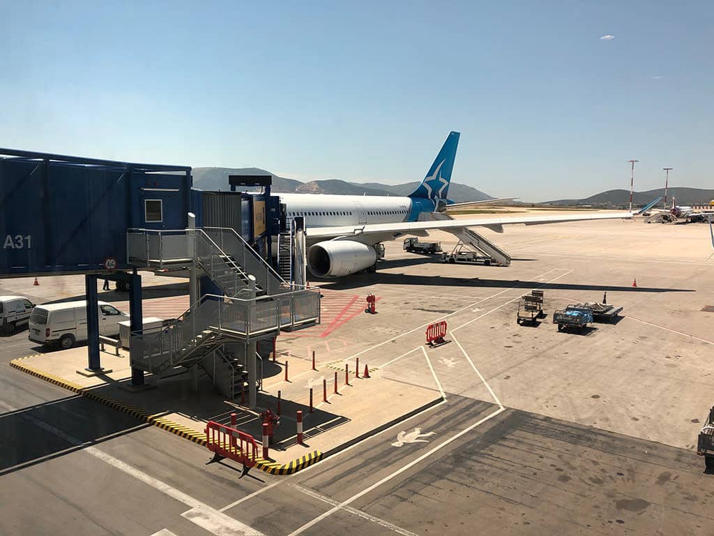 airplane arrival in athens airport in greek islands travel guide
