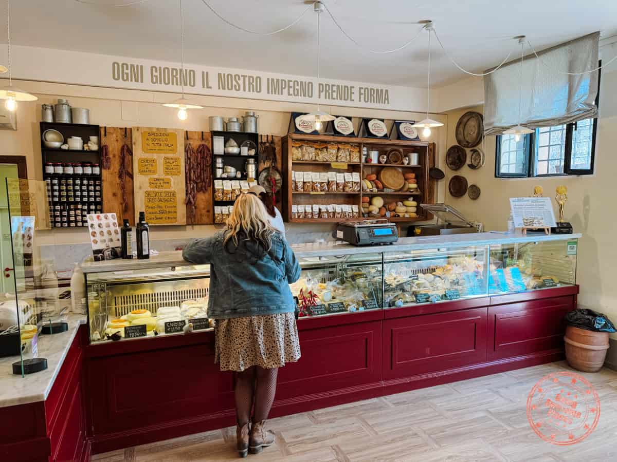 caseificio cugusi silvan shop interior with cheese and cured meats