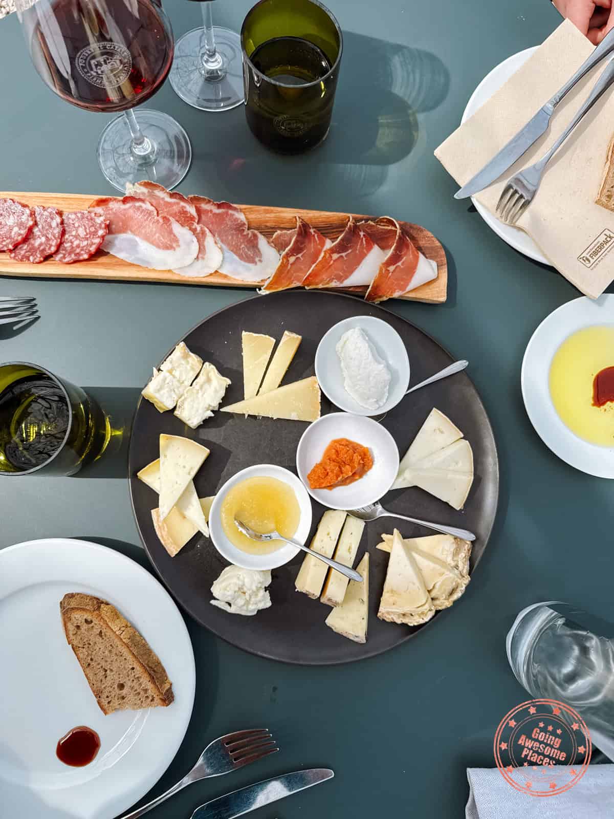 cheese charcuterie and wine served as part of podere il casale tour