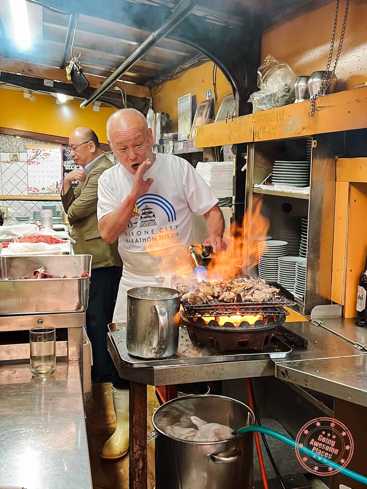 chef toyoji chikumoto tuna cheek flaming show in osaka