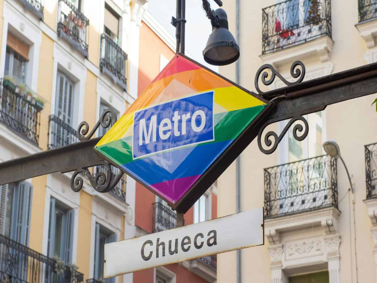 chueca rainbow metro sign
