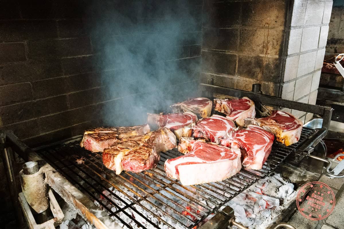 florentine steak grilling at antica macelleria cecchini