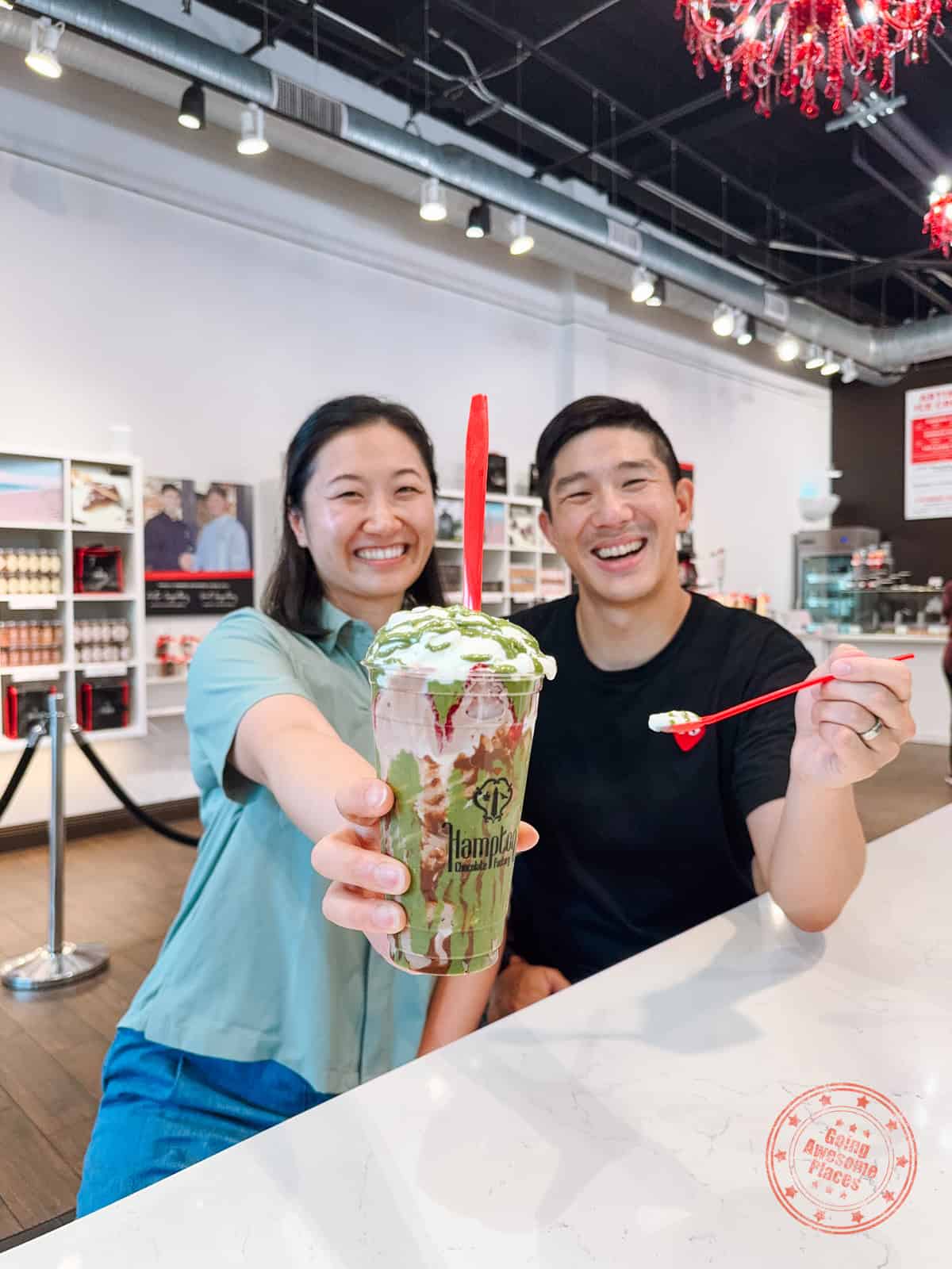 asian couple enjoying dubai chocolate sundae at hampton chocolate factory in tampa