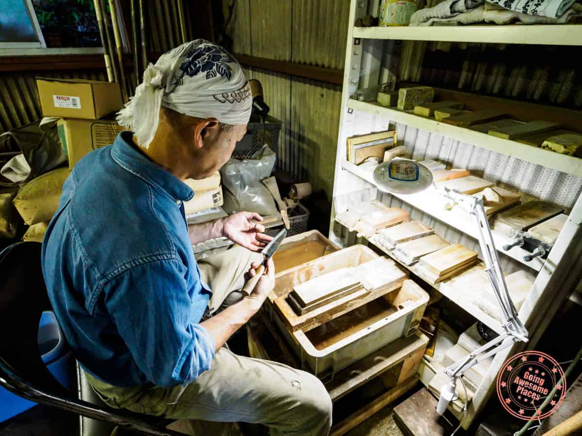 knife sharpening at kurogane workshop in shikoku japan