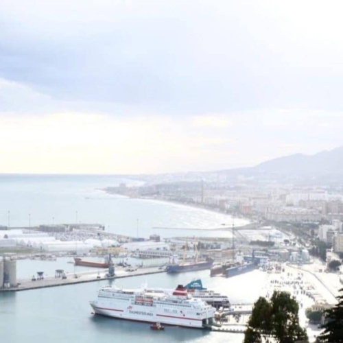 overlook of malaga spain coast with boats on water