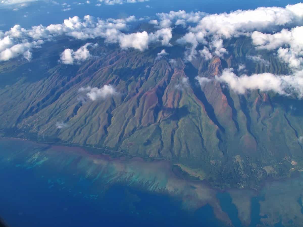 aerial view of molokai beneath the clouds