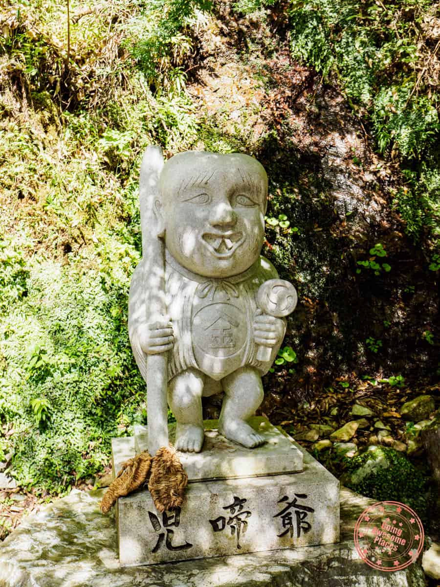 oboke valley yokai village stone statue of konaki-jijii