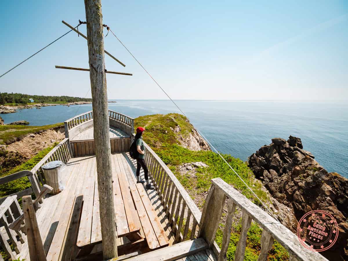 standing on wooden boat replica at parc colborne hike trail in southern gaspesie
