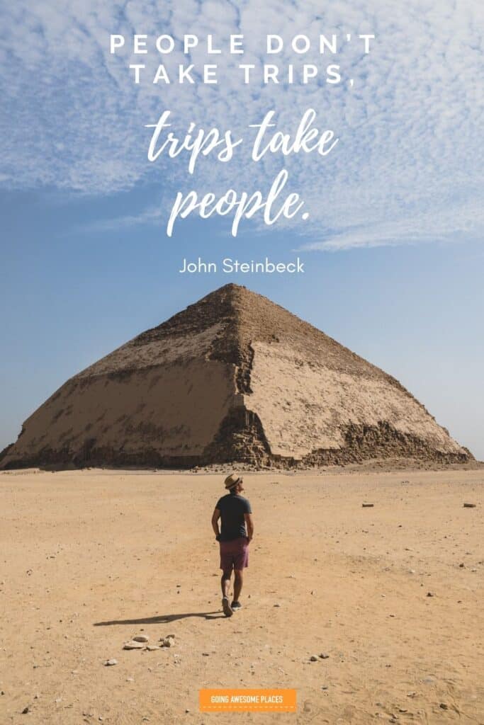 people don't take trips, trips take people travel quote by john steinbeck walking towards red pyramid in egypt
