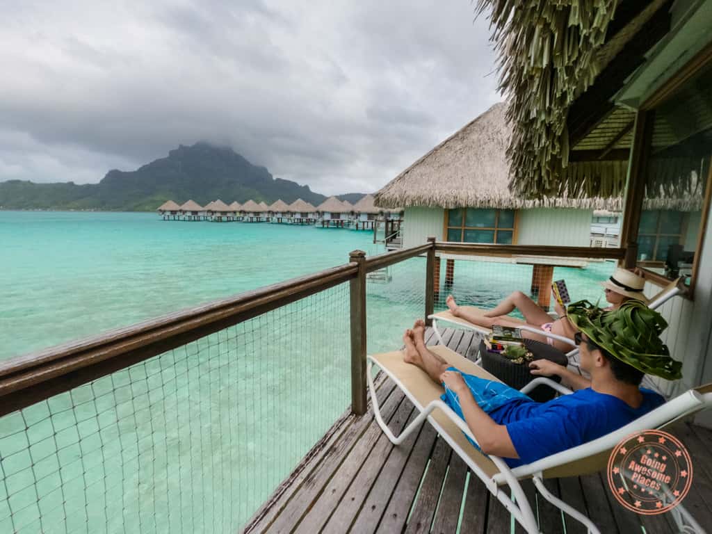 reading on the deck of le meridien bora bora
