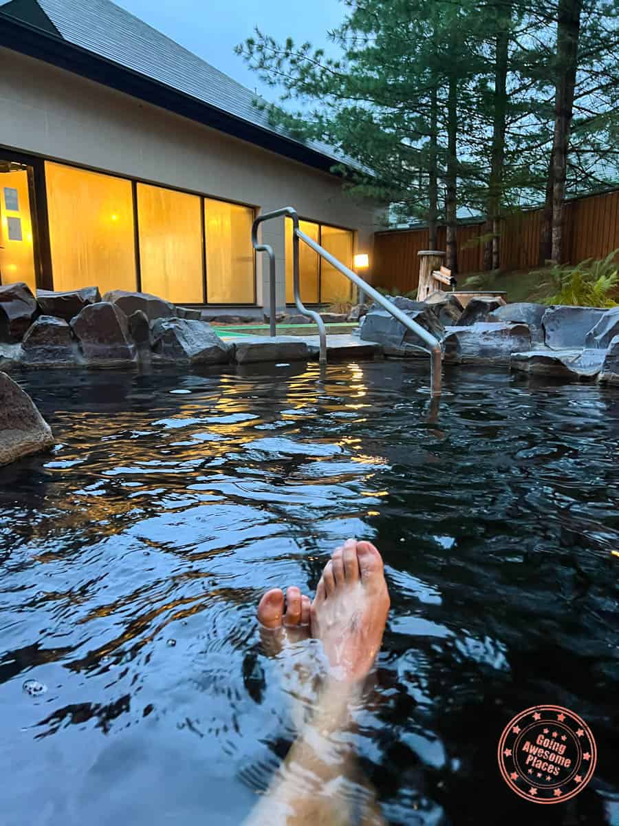 relaxing in hotel taito outdoor onsen pool