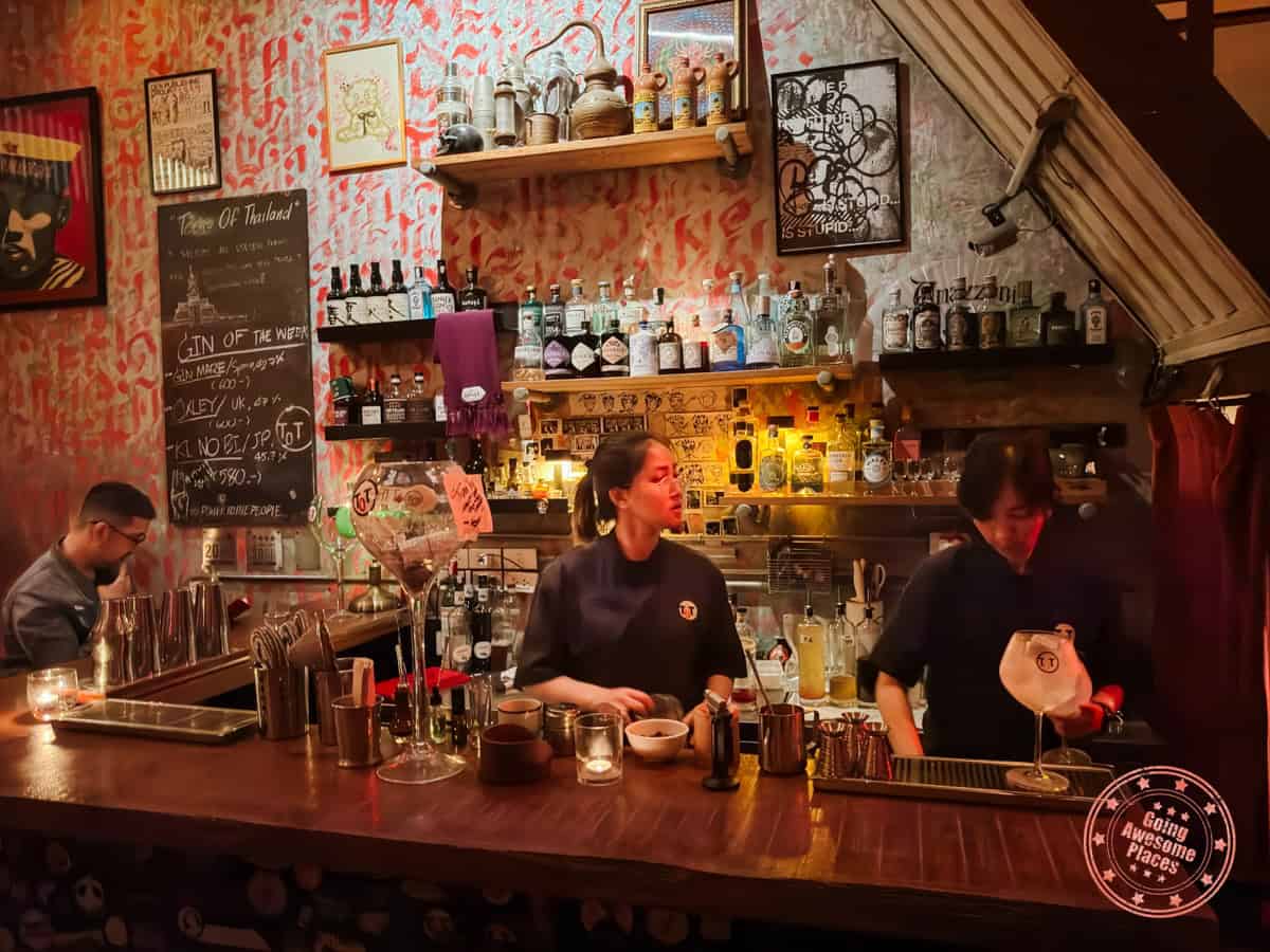 bartenders working at teens of thailand cocktail bar in bangkok
