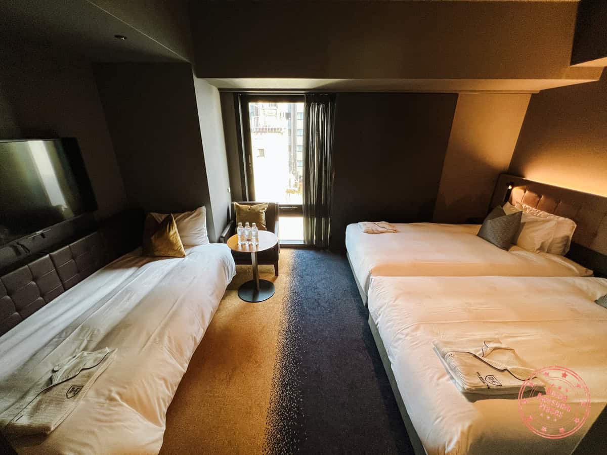 triple occupancy configuration at the royal park canvas ginza 8 hotel in tokyo