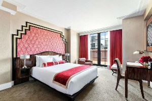 walker hotel greenwich viallage large suite with bed, desk and window