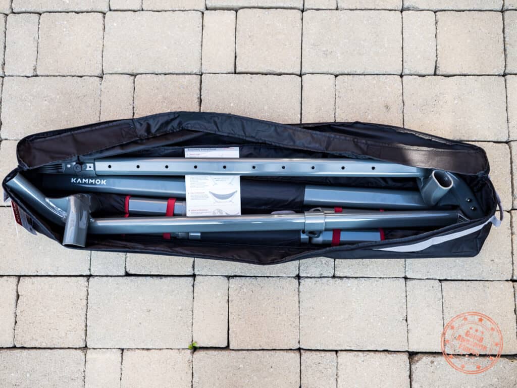 kammok swiftlet travel bag with all the parts of the portable hammock stand inside